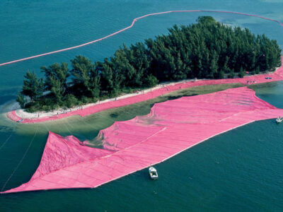 image of pink cloth surrounding an island with trees